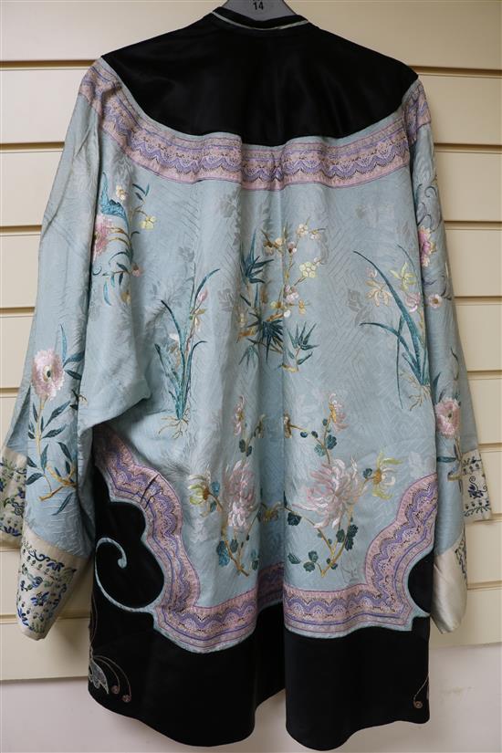 A Chinese embroidered silk robe, eau de nil ground, late Qing
